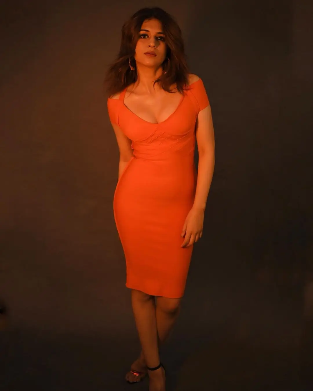 Shraddha Das Long Legs Show in Orange Mini Skirt